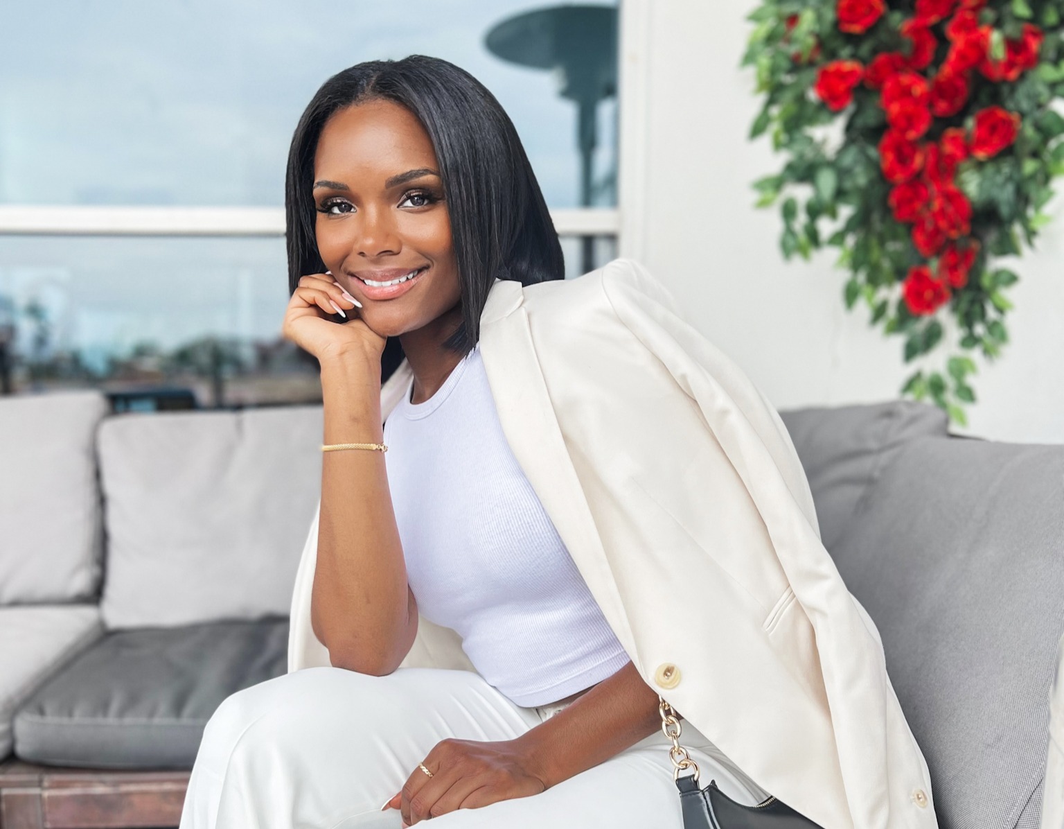 London smiling in ivory tailoring during the personal brand shoot
